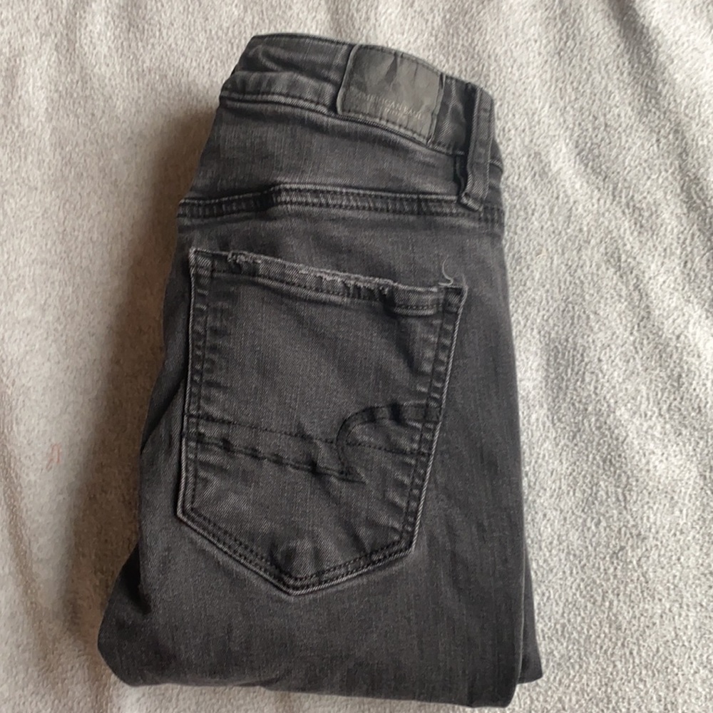 Black washed American Eagle size 2 extra long jeans SUPER STRETCH